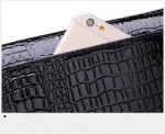 sac en cuir noir style alligator pour femme