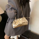 pochette tendance dorée en cuir PU