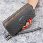 pochette DINVA en cuir pour femme