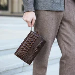 pochette élégante en cuir pour homme