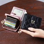 pochette élégante femme avec fermeture éclair en cuir