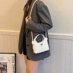 sac à bandoulière matelassé femme en denim