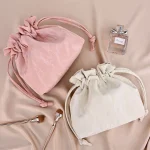 pochette maquillage en forme de tonneau