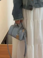 pochette femme stylée avec pendentif