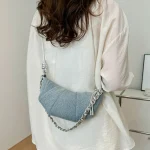pochette en jean avec fermeture éclair